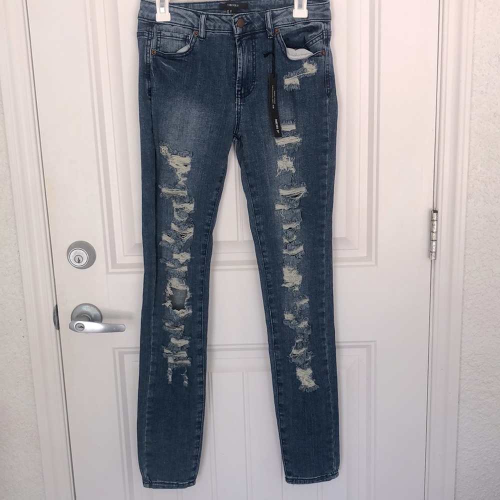 Distressed denim jeans